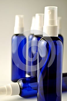 Dark blue glass bottles for cosmetic lotions, serums, oils