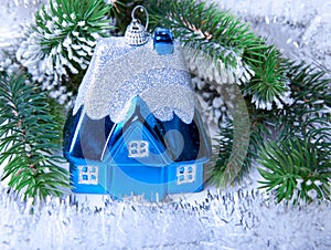 Dark blue New Year's toy small house- idea of dream of own house in New year