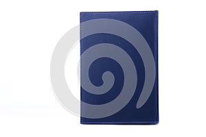 Dark blue notebook isolated on white.
