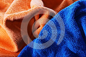 Dark blue and orange fabric with fibres