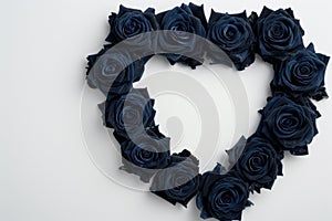 dark blue roses in heart shape
