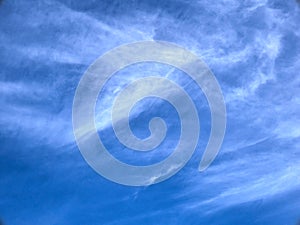 Dark blue sky with clean white clouds perfect for website banners, and background.