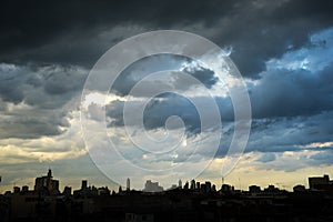 Dark blue storm clouds over city in rainy season