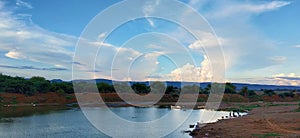 Dark blue stormy sky with clouds, abstract nature background. Blue sky panorama background with clouds in the morning. Blue sky