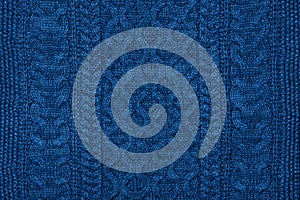 Dark blue sweater knit textured background