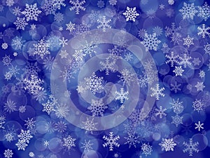 Dark blue winter background with snowflakes and boke