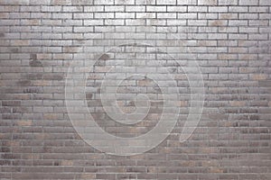 Dark brick wall pattern with chaotic masonry order. Background texture or resource for 3d texturing. Many bricks in big modern