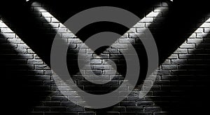 Dark brick wall texture under dramatic spotlights