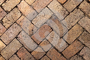 Dark brown old bricks wall