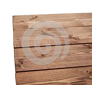 Dark brown paint coated wooden boards