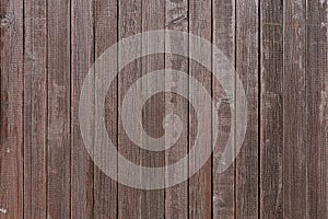 Dark brown weathered wooden fence