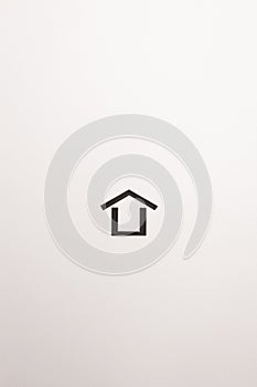 Dark brown wooden minimal house icon on white background