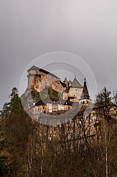 Dark castle on the top of the cliff.