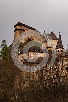 Dark castle on the top of the cliff.