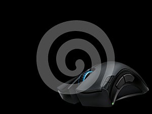 Dark charcoal color gaming mouse with multiple function buttons