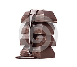 Dark Chocolate Baking Bar Stack with Pouring Melted Chocolate photo