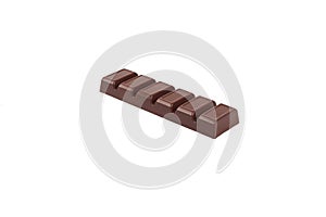 Dark chocolate bar isolated on a white background.