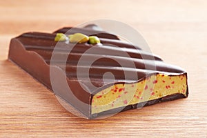 Dark chocolate bar with pistachio and strawberry