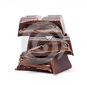 Dark chocolate bars stack isolated