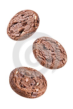 Dark chocolate brownie cookies with chocolate slices on a white isolated background