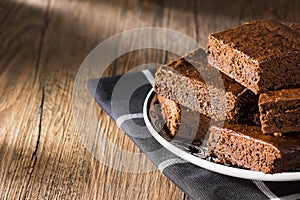 Dark Chocolate Brownies on Rustic Wood