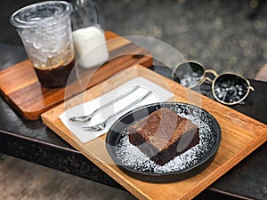 Dark chocolate brownies served with coffee