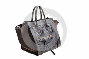 Dark chocolate leather womens bag on white background.