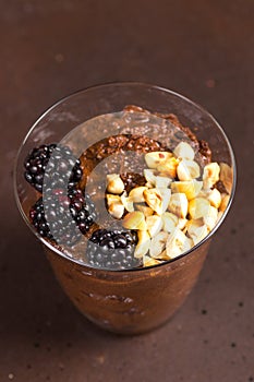 Dark chocolate mousse with blackberries and roasted hazelnuts
