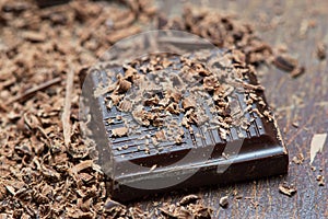Dark chocolate piece with background