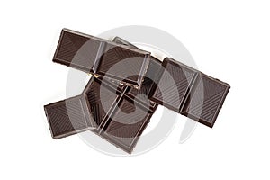 Dark chocolate pieces isolated with clipping path, flat lay