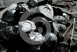 Dark chocolates rapped in a silver foil