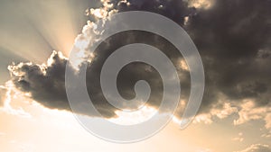 Dark cloud with sunlight for background wallpaper