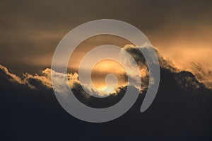 Dark clouds on a golden sky