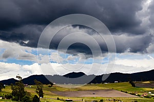 Dark clouds over the beautiful mountains of the municipality of La Calera located on the Eastern Ranges of the Colombian Andes