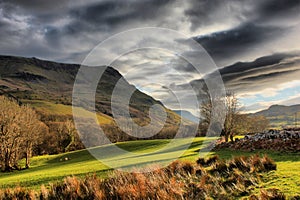 Dark clouds over the cadair idris mountain range in snowdonia