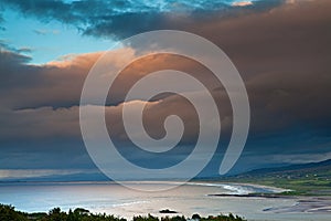 Dark clouds over Irish coast Dingle peninsula photo