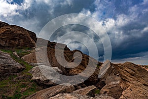 Dark clouds over rocks