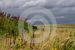 Dark clouds over the rough landscape of northern Ireland