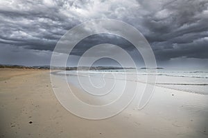 Dark clouds over sea. Dramatic dark cloudy sky over sea, natural photo background. Dark storm clouds background