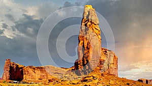 Dark clouds over the Thumb, a massive Red Sandstone Formation in Monument Valley