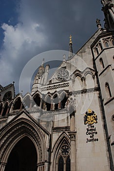 Dark clouds of the Royal Courts of Justice in central London
