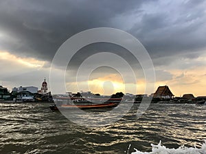 Dark clouds during sunset above the Chao Phraya River