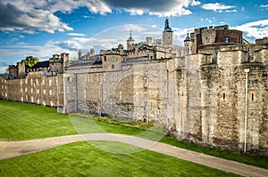 Dark clouds surround the Tower of London on cloudy day