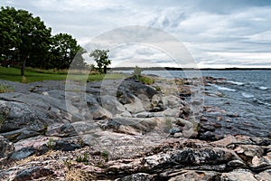 Dark clouds and wild rocks at the coastline of the Baltic Sea