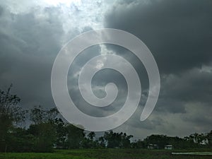 Dark cloudy sky before rain in the field