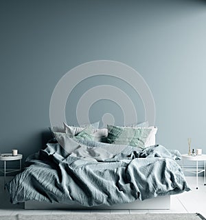 Dark cold blue bedroom interior with linen sheet on bed, wall mock up