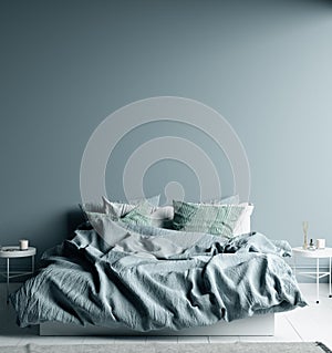 Dark cold blue bedroom interior with linen sheet on bed, wall mock up photo