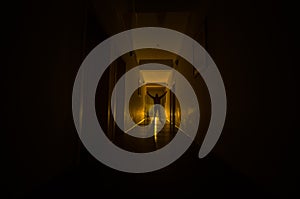 Dark corridor with cabinet doors and lights with silhouette of spooky horror man standing with different poses.