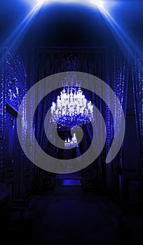Dark corridor with neon light, luxurious interior in a night club version. Louvr