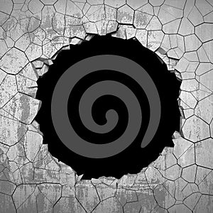 Dark cracked broken hole in concrete wall. Grunge background